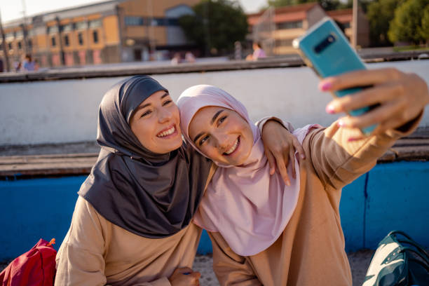 istock Muslim women taking selfie after workout 1268399869