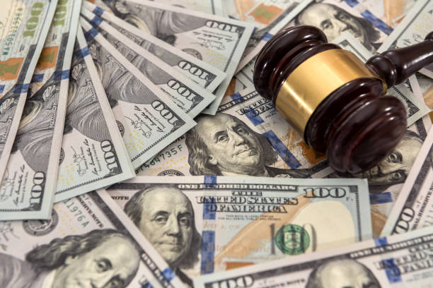 istock justice gavel on dollar banknotes 1268401044