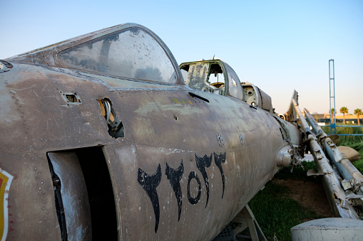 A battlefield in Iran exhibiting a wrecked military aircraft. It had been attacked and shot down by the Iranian army during the longest war in the middle east. A war between Saddam Hussein and Khomeini which lasted 8 years.