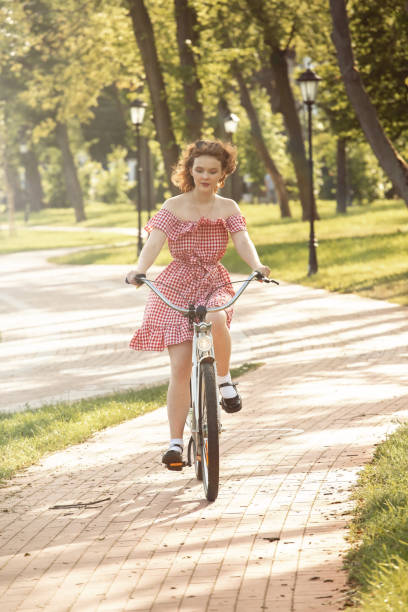 istock girl with bike 1268404722