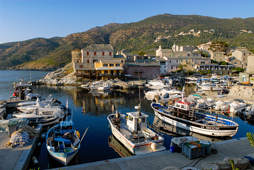 Centuri, corsica, France - 07/31/2018 : the picturesque port of Centuri with its traditional fishing boats on Cap Corse