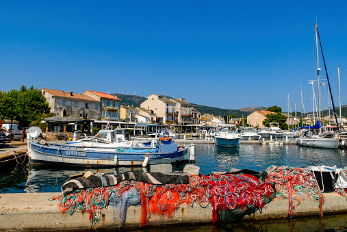 Macinaggio, Corsica, france - 07/31/2018 : the picturesque port of Macinaggio with its traditional fishing boats on Cap Corse