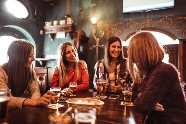 istock people talking indoors in a pub with the beers 1268406833