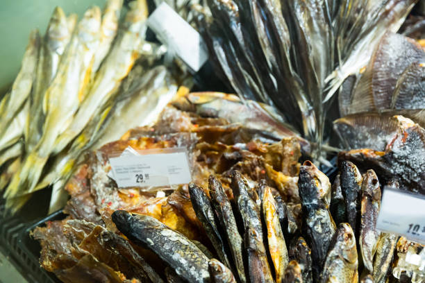 istock Dried salted fish on store counter 1268406924