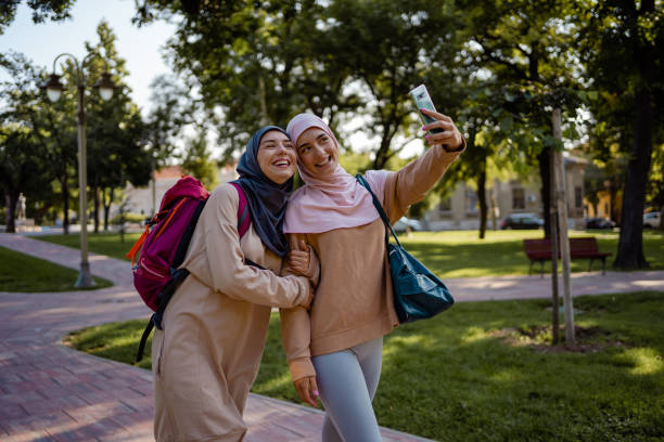 istock Muslim women taking selfie after workout 1268411286