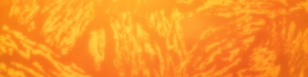 istock Panorama of orange pattern wallpaper with irregular stripes as an abstract background. 1268412837