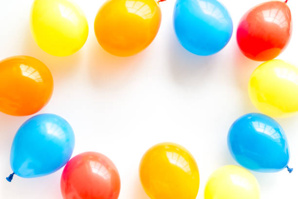 festive multicolor balloons columns, isolated on white