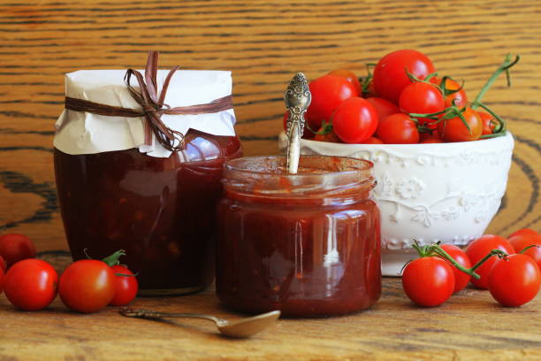 Cherry tomato and chili jam preserves in a jar