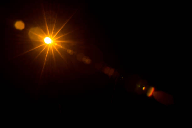 istock Abstract Natural Sun flare on the black 1268422136