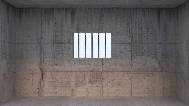 więzienna cela ze światłem świecącym przez zamknięte okno - wewnątrz bariery więzienia, - barred windows zdjęcia i obrazy z banku zdjęć