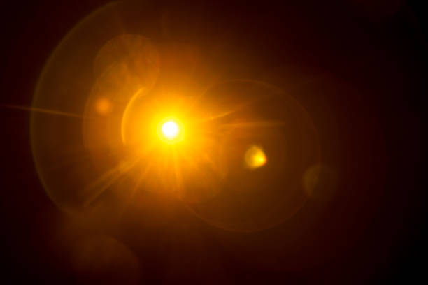 istock Abstract Natural Sun flare on the black 1268423063
