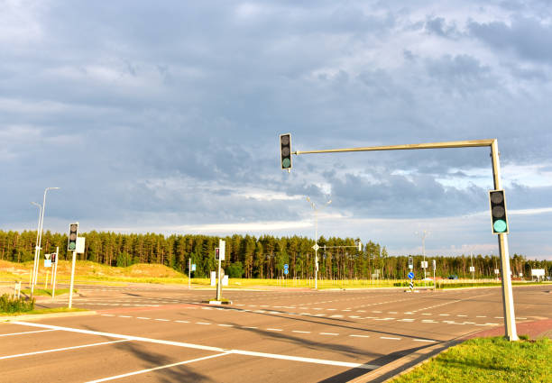 istock Green traffic signal at road. Traffic light control and coordination 1268423107