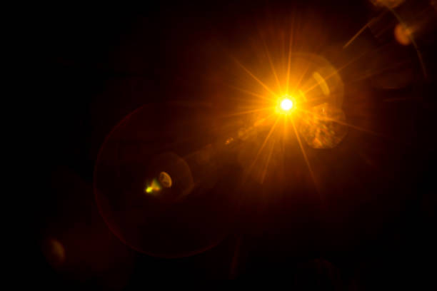 istock Abstract Natural Sun flare on the black 1268423115