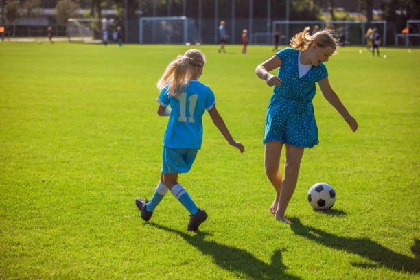 istock Two beautiful dutch sisters playing soccer 1268423563