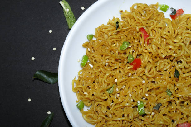 istock instant noodles in the bowl on black background 1268426452