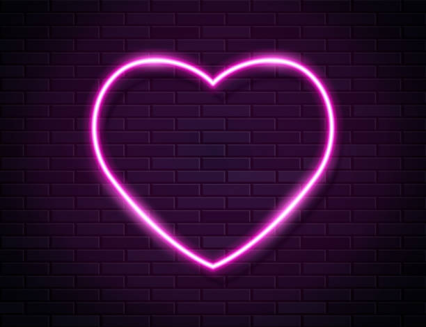 istock Neon Pink Glowing Heart Banner on Dark Empty Grunge Brick Background. 1268428244