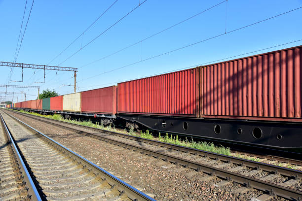 istock Cargo Containers Transportation On Freight Train By Railway. Intermodal Container On Train Car. Rail Freight Shipping Logistics. Import - export goods 1268429275
