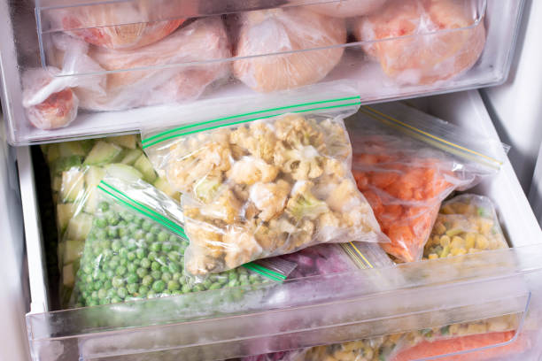 istock Frozen cauliflower in plastic bag in a freezer 1268433764