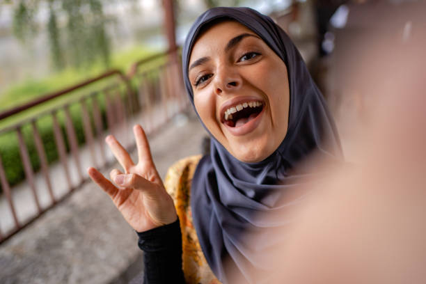 istock Muslim woman taking selfie 1268435246