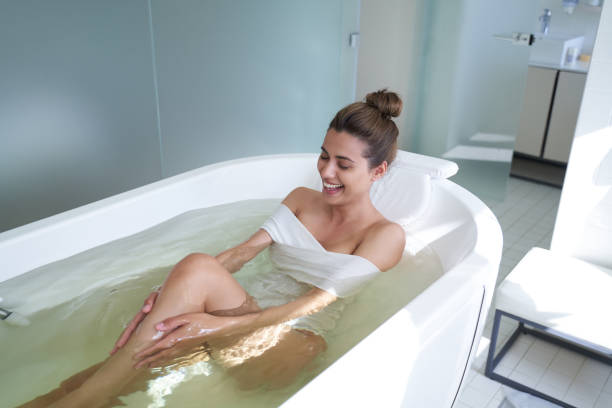 istock Excited lady having fun during her hydrotherapy 1268438737