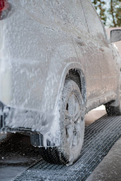 istock carwash concept car in foam 1268441787