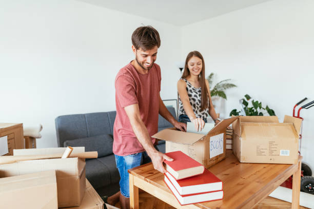 istock Couple moving in new apartment 1268441842