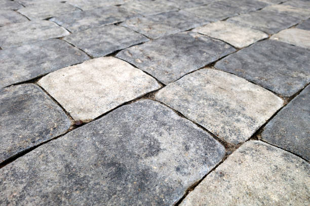 istock Stone walkway and cobbled road. 1268446623