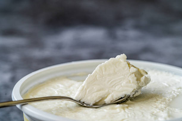 istock Instant Sheep Yogurt / Yoghurt with Spoon in Plastic Cup. 1268452061