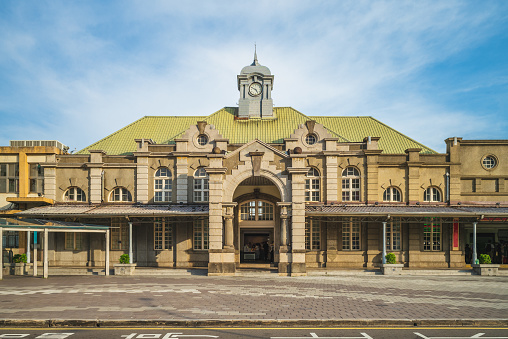 Cardiff, Wales - July 2019: Exterior view of the front of Cardiff Central railway station in the city centre. The area outside the entrance has been pedestrianized,