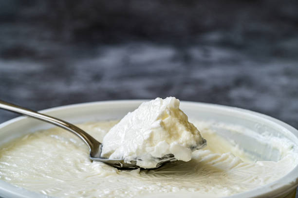istock Instant Sheep Yogurt / Yoghurt with Spoon in Plastic Cup. 1268454903
