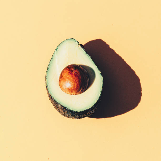 istock Avocado. Minimal flat lay art. Vegan concept 1268456313