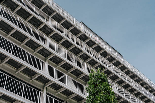 istock metal car park building under a bright blue sky 1268456592