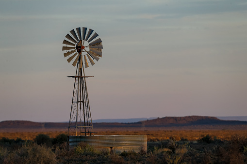 A windpomp and reservior dam in the Karoo, South Africa.