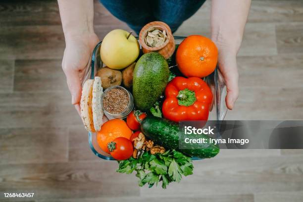 Functional Foods Health Super Food Concept Very High In Minerals Vitamins Antioxidants Omega 3 Various Vegetables Fruits Nuts And Seeds In Woman Hands Stock Photo - Download Image Now