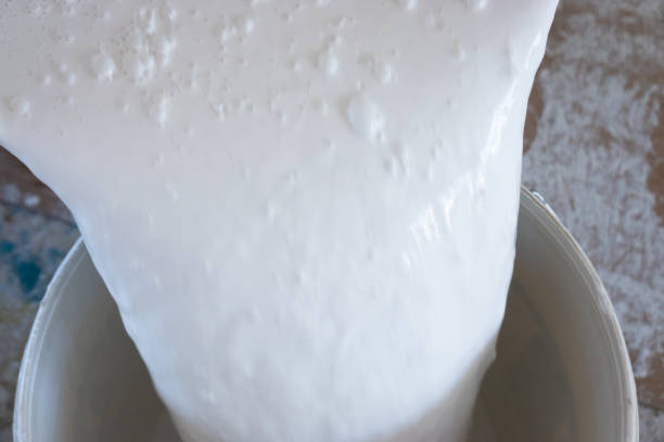 istock white Emulsioni paint in tank 1268464884