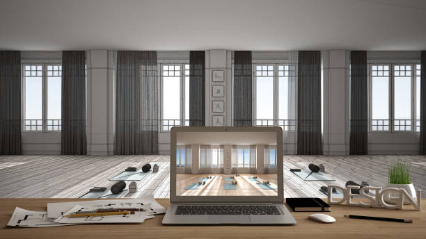 istock Architect designer desktop concept, laptop on wooden work desk with screen showing interior design project, blueprint draft background, yoga studio with mats, pillows and accessories 1268466540