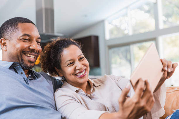 istock Happy couple taking selfie 1268467624