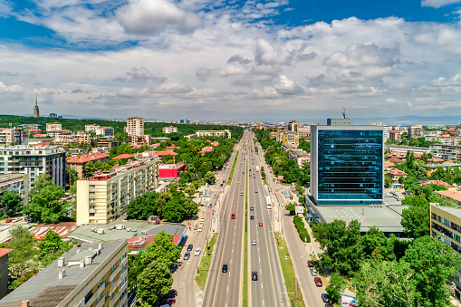 Wide aerial drone shot of  Sofia city, Bulgaria. Tzarigradsko shose and Pliska hotel -  (Bulgarian : Цариградско шосе и хотел Плиска). The picture was taken at day time with DJI Phantom 4 Pro drone / quadcopter.