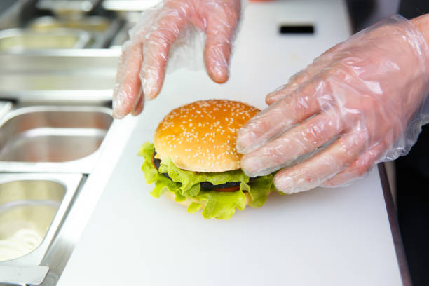 istock The chef's hands demonstrate the finished Burger. 1268472936