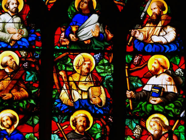istock Stained glass saints from saint Cecilia Church 1268477458