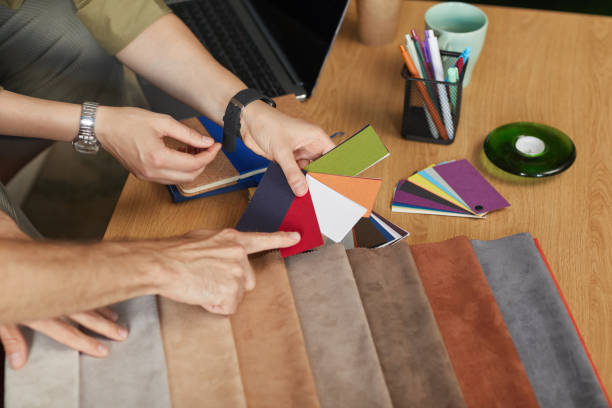 istock Fashion designers examining samples 1268479604
