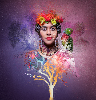 Woman with tree and parrot with multiple exposure technique