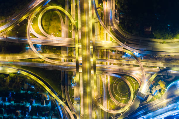 istock Vehicle light movement rush hour on city traffic junction road 1268481203
