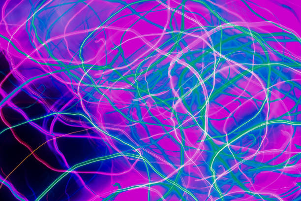 istock Glowing neon lines. Blue red pink and violet colorful lighting. 1268481635