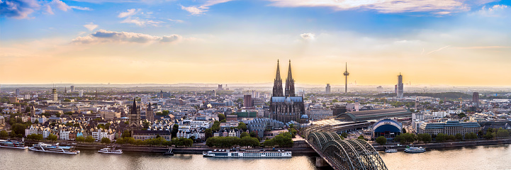Panorama of Cologne with Cologne Cathedral and the Rhine on a beautiful summer evening