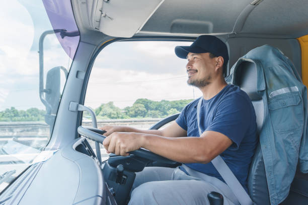 istock young man driving a car 1268487378