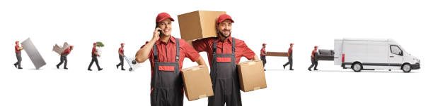 istock Movers putting household items in a van and two workers posing in the front 1268487468