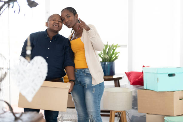 istock Affectionate LGBTQI couple imagine new home together 1268495327