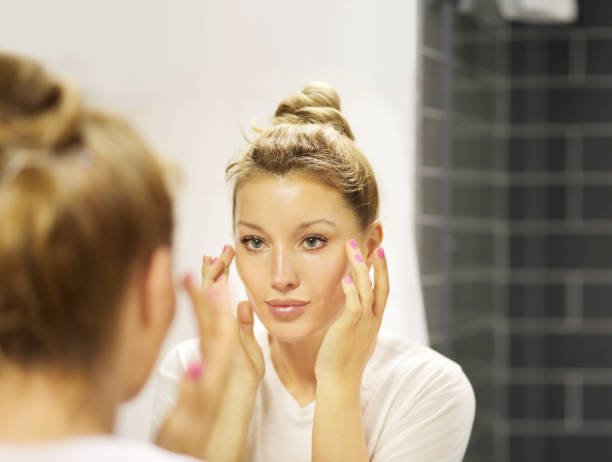 istock Magic anti-aging cream.Applying the cream 1268503033
