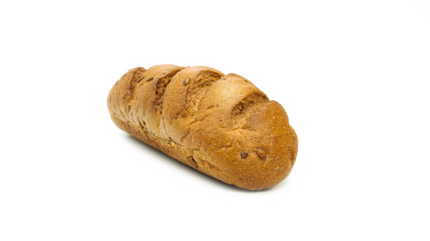istock Long loaf with cereals on a white background 1268505379
